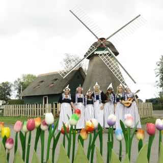 Picture in Volendam Costume with Cheese and Clog Tour