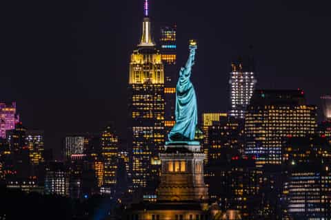 Night skyline helicopter views of Midtown Manhattan