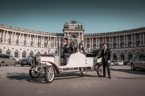 Vienne : visite touristique en voiture rétro électriqueVisite de 90 min avec vin pétillant