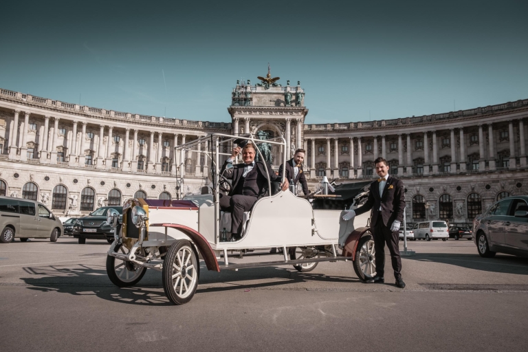Vienne : visite touristique en voiture rétro électriqueVisite de 60 min avec vin pétillant