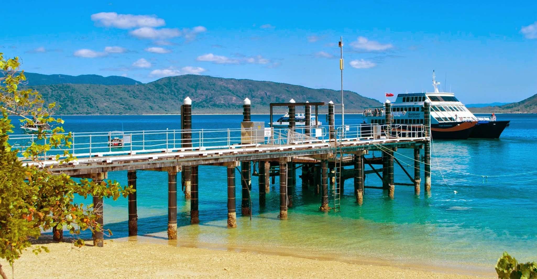 Cairns Fitzroy Island Ferry with Snorkeling and Boat Tour TourMega