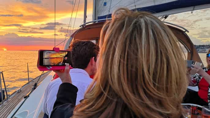 lisbon private yacht tour along coast and sunset views