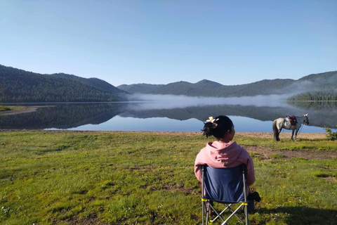 Horseback riding to Khagiin Khar lake