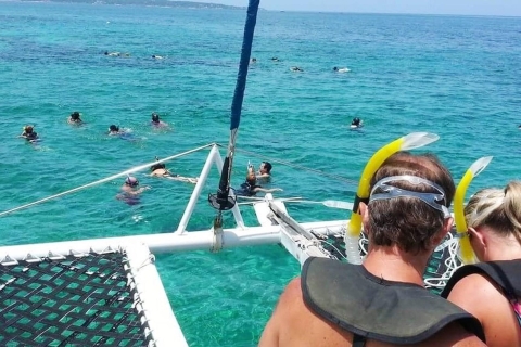 Negril Beach and Catamaran Cruise Tour with Pickup from Montego Bay & Falmouth