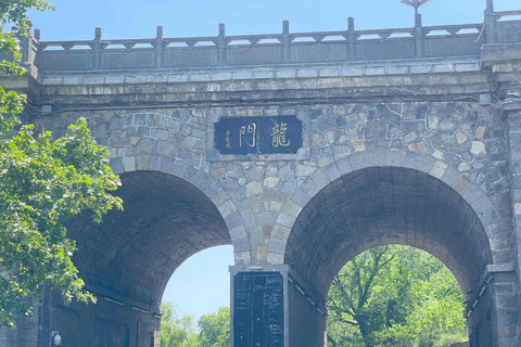 From Zhengzhou: Longmen Grottoes & Guanlin Day Trip Transfer, Entrance Ticket & Chinese-Speaking Guide