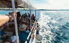 Rovinj: Sunset Cruise with Swim Stop, Drinks, and Fruits