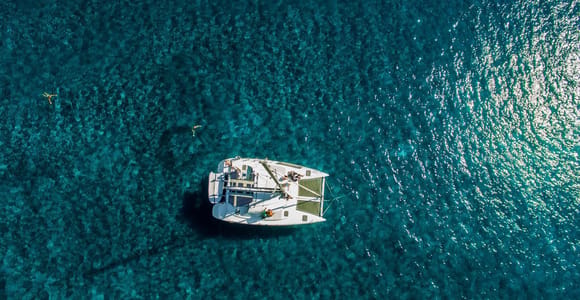 Santorini: Private Catamaran Cruise with Food & Drinks