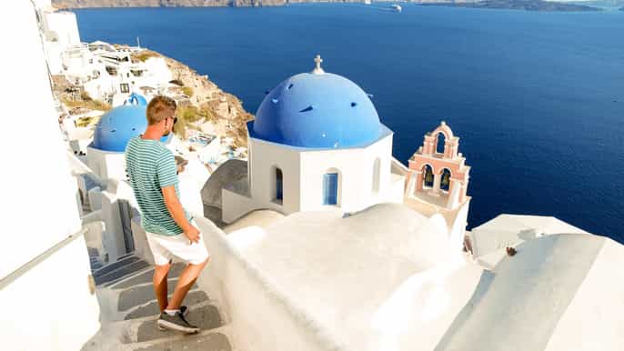 desde santorini islas volcánicas y atardecer en oia