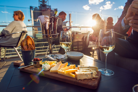 Santorini: dinnercruise bij zonsondergang, met bezoek aan de vulkaan en warmwaterbronnen