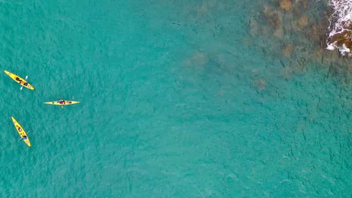 santorini kayaking picnic at red white black beach