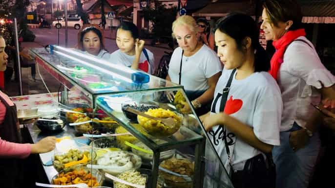 luang prabang local food tour at night by vintage tuktuk