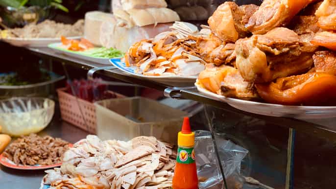 hoi an street food experience tour by bike from hoi an