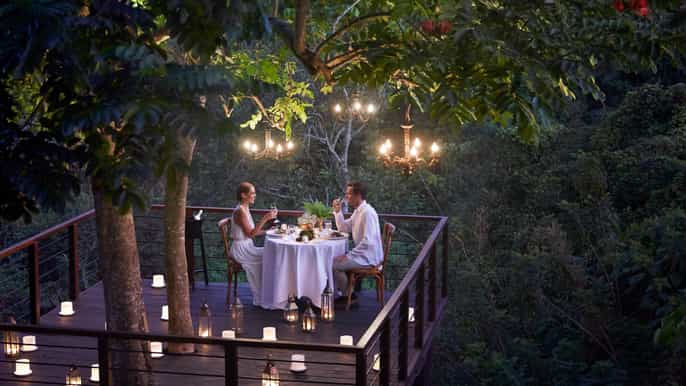 ubud romantic dinner on a forest tree deck