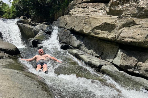 El Yunque Rainforest; Waterslides, Beach, Dine and Shop Tour El Yunque Rainforest Waterslides and Beach Tour