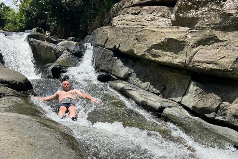 El Yunque Rainforest; Waterslides, Beach, Dine and Shop Tour El Yunque Rainforest Waterslides and Beach Tour