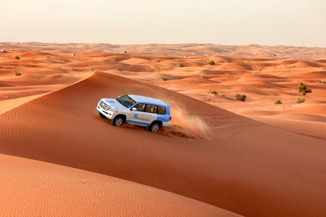 Visit Abu Dhabi Morning Desert Tour, Camel Ride, & Sandboarding in Yas Island, Abu Dhabi, UAE
