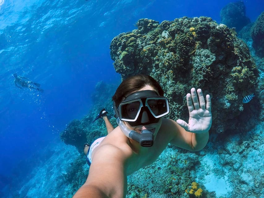 Cozumel catamarán y esnórquel en bahía y playa El Cielo GetYourGuide