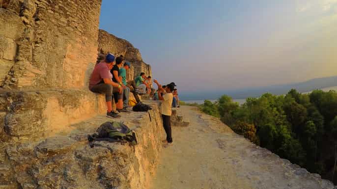 from flores yaxha national park sunset tour