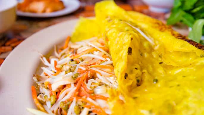 ho chi minh city private vegan food tour by scooter