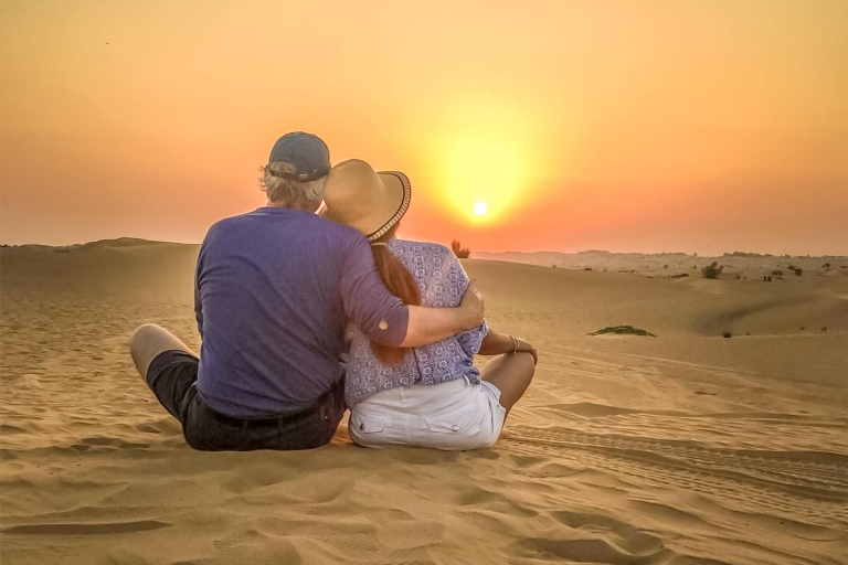 Doha: Sunset Desert Safari with Camel Ride and Sandboarding Shared Tour