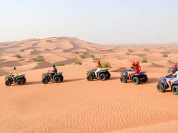 Dubai: Wüsten-Quad-Safari, Kamelritt, Sandsurfen und BBQ. Foto: GetYourGuide Dubai: Wüsten-Quad-Safari, Kamelritt, Sandsurfen und BBQ. Foto: GetYourGuide