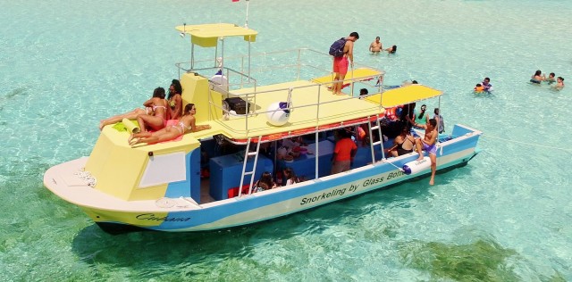 Visit Cozumel VIP Glass Bottom Boat & Snorkeling 3 Reefs Tour in Playa del Carmen
