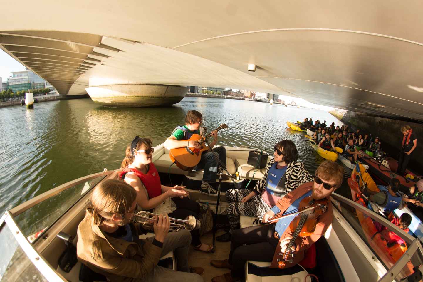 boat tours in dublin | prepare to be entertained by local musicians on this kayaking tour