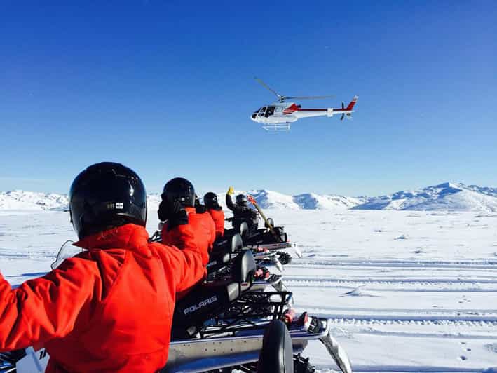 Queenstown Snowmobiling Experience with Helicopter Flight GetYourGuide
