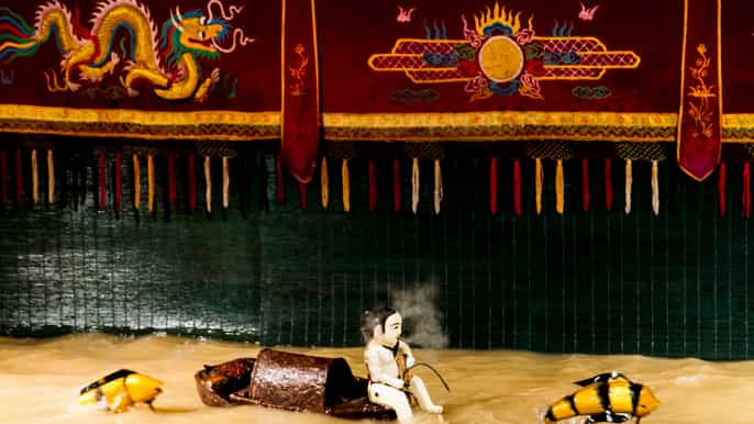 ho chi minh water puppet show with dinner cruise