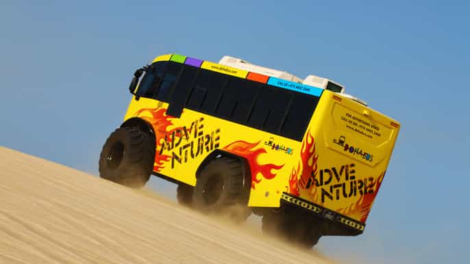 from doha monster bus desert tour