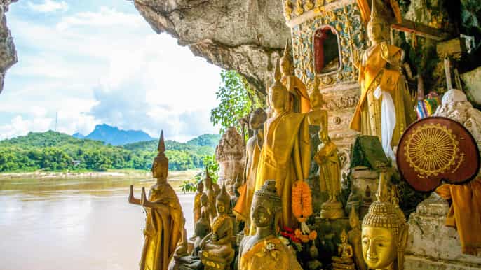 pak ou caves whisky village kuang si falls day trip