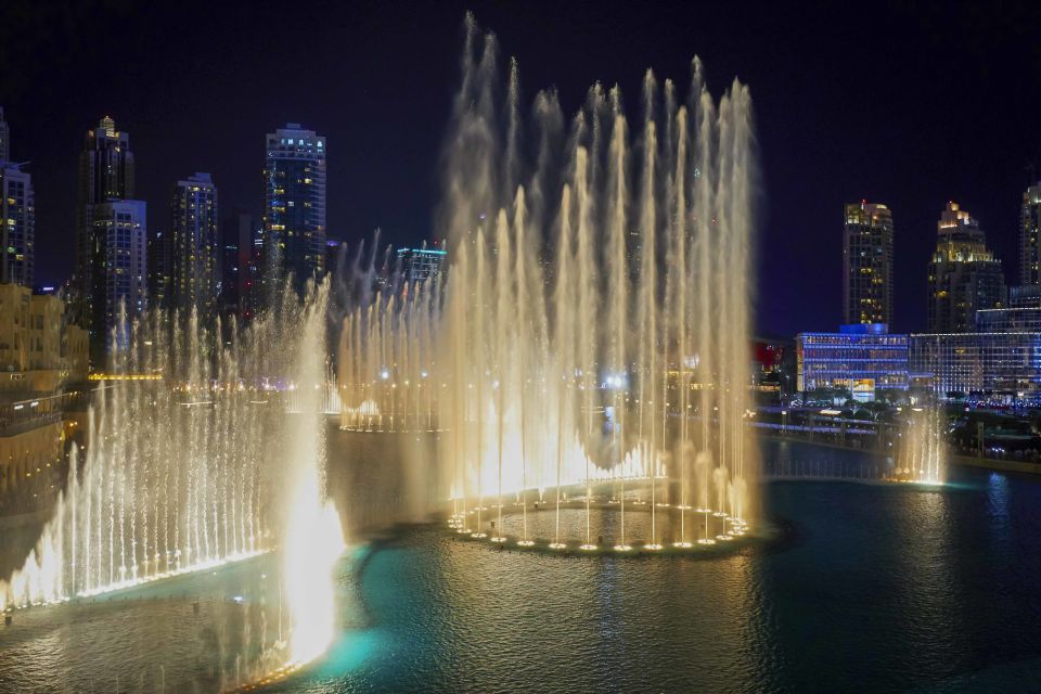 Dubai: Burj Khalifa Fountain Show and Burj Lake Ride | GetYourGuide
