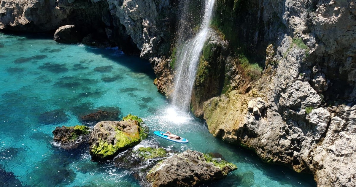 Ruta libre en paddel surf por la cascada de Nerja y Maro . | GetYourGuide