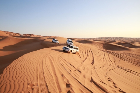 Dubaï : safari sur les dunes avec quad, sandboard et chameauVisite en groupe avec quad