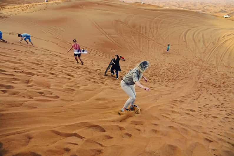 Dubai Safari Por Las Dunas Rojas Con Quad Sandboard Y Camellos