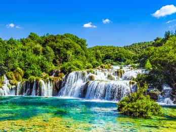 Da Spalato e Trogir: Tour di un giorno alle cascate di Krka con giro in barca