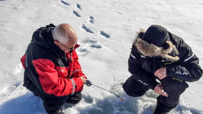arctic circle ice fishing experience with bbq