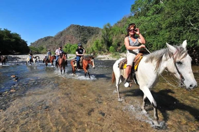 Puerto Escondido: paardrijden bij zonsondergangPuerto Escondido: paardrijtocht naar de warmwaterbronnen van Atotonilco