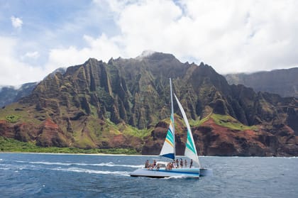 Kauai: Napali Coast Sunset Sailboat Tour with Dinner | GetYourGuide