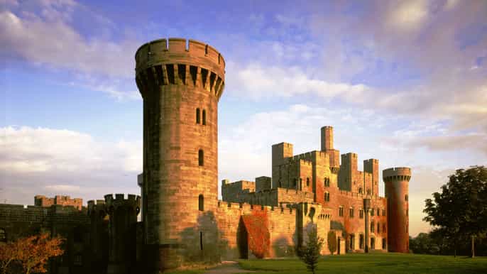 from llandudno fullday anglesey castles bus tour