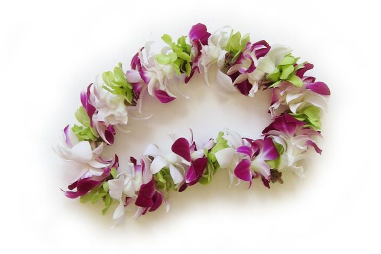 Oahu: tradycyjne powitanie na lotnisku Honolulu (HNL)Powitanie klasyczne z kwiatami storczyków
