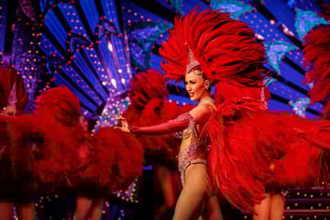 Paris: Moulin Rouge Dinner Show with Champagne and Pickup