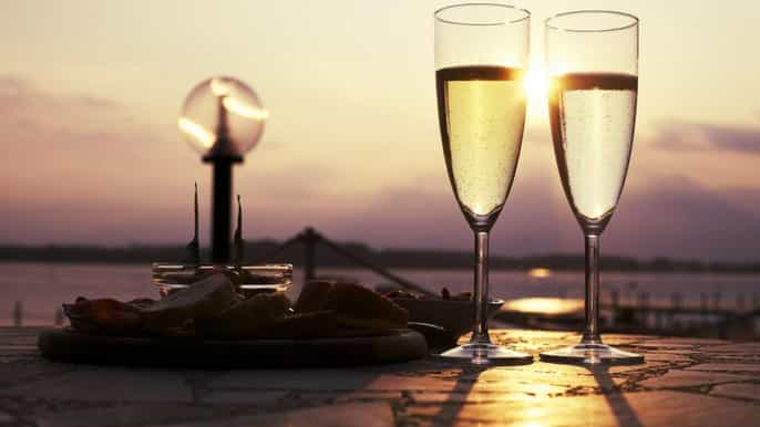 venice sunset cruise with glass of wine