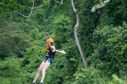 Vang Vieng: Half-Day Zip Lining with Cave Exploration Option