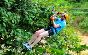 From Belize City: Zip Lining and Cave Tubing Adventure