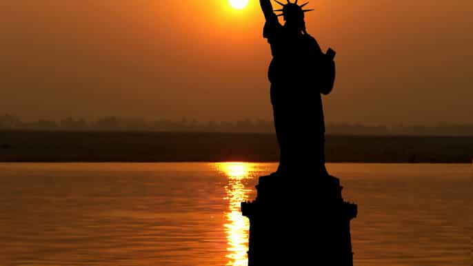 new york statue of liberty and ellis island sunset cruise