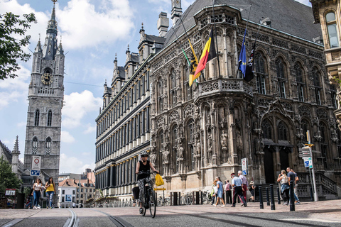 Brussels: Tour Bruges & Ghent with Cruise + Chocolate visit Tour in Spanish