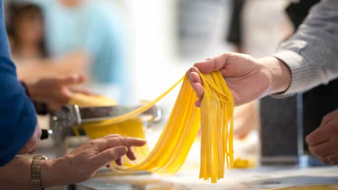 Área del lago de como experiencia de cocina italiana con pasta