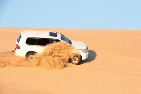 Doha : Safari dans le désert avec quad, planche de sable et promenade en chameauVisite partagée