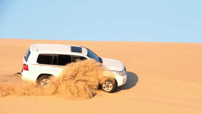 doha desert safari w/ quad bike sandboarding camel ride